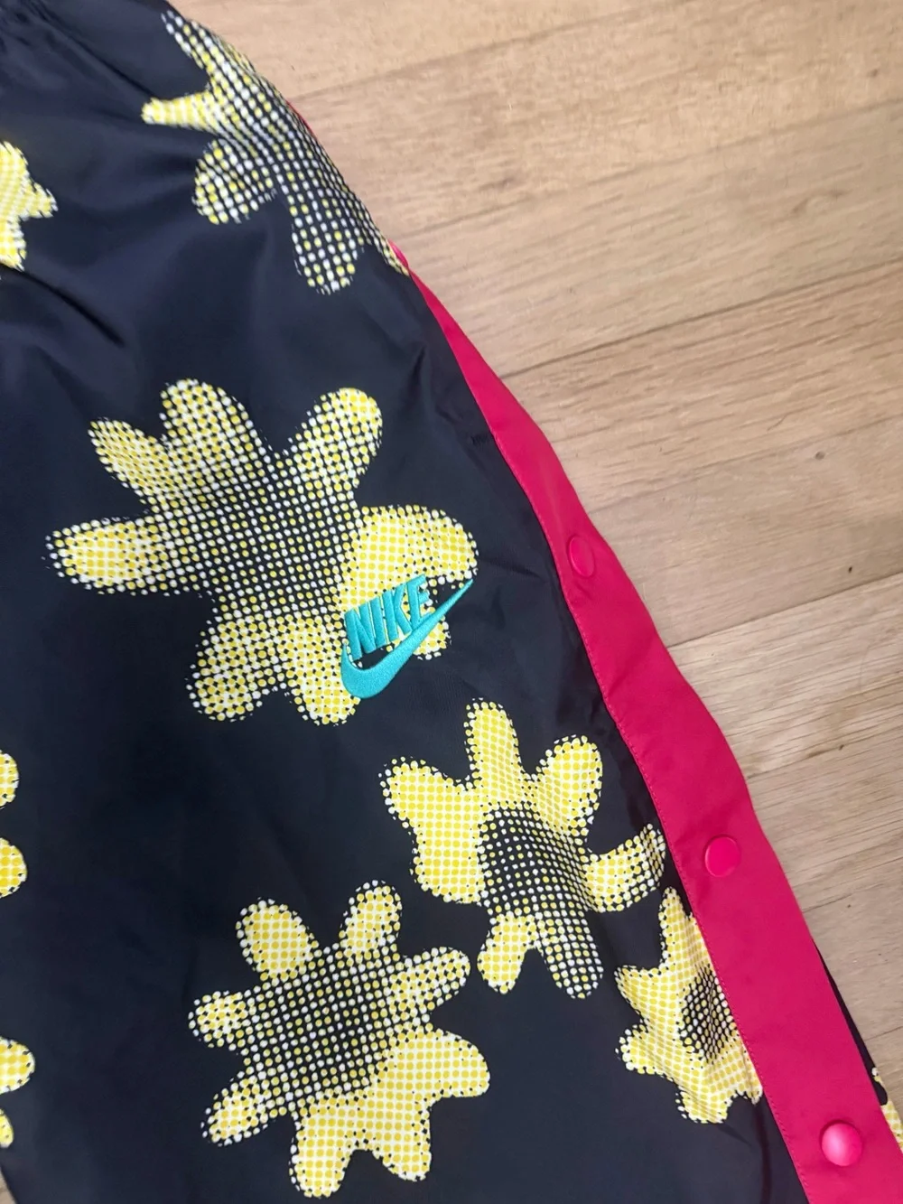 Nike Black Floral Track Pants with Yellow Print and Pink Side Stripe